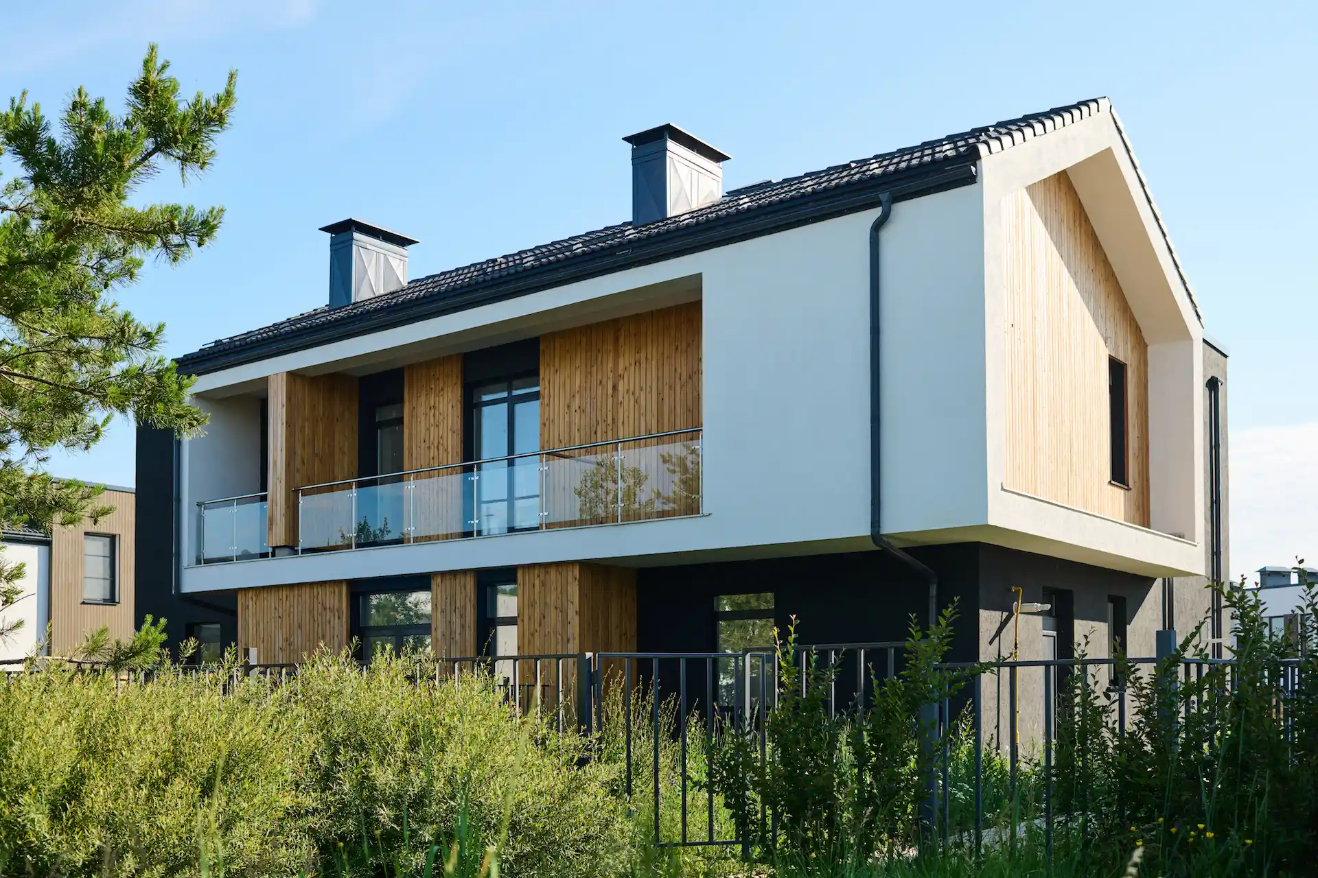 two-storey-cottage-with-balcony-and-group-of-windo-2023-11-27-05-09-38-utc